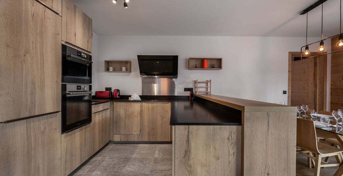 Located on the first floor in a new residence of Courchevel 