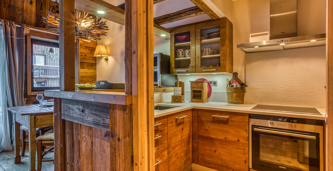 The wood gives its atmosphere, this apartment for rental
