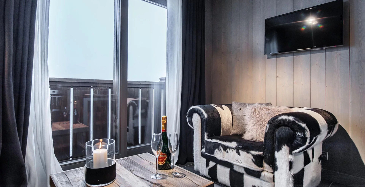 The 50 m² apartment is located on the level -2 in the Chalet