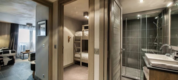 The 50 m² apartment is located on the level -2 in the Chalet